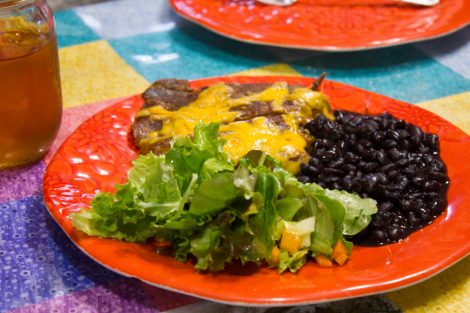 plate of food with salad, beans