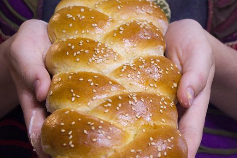 challah bread braid in hands