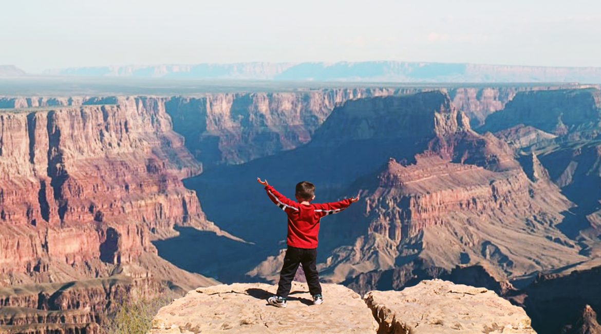 joe on the edge of the grand canyon