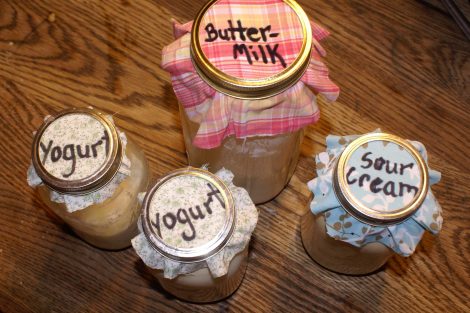 4 jars with lids saying "sour cream" etc